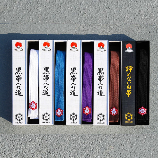 KANJI KAZE BJJ belts displayed in official product boxes