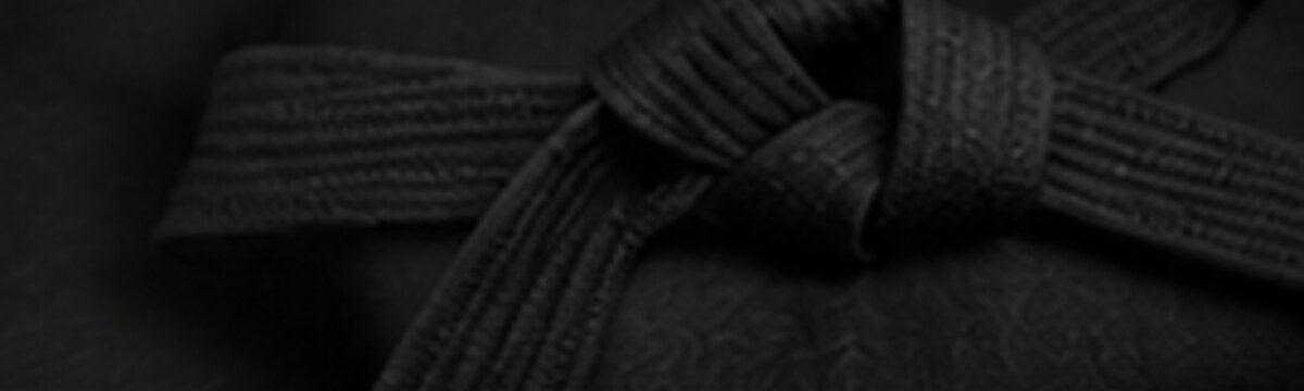 KANJI BJJ belt tied at the waist